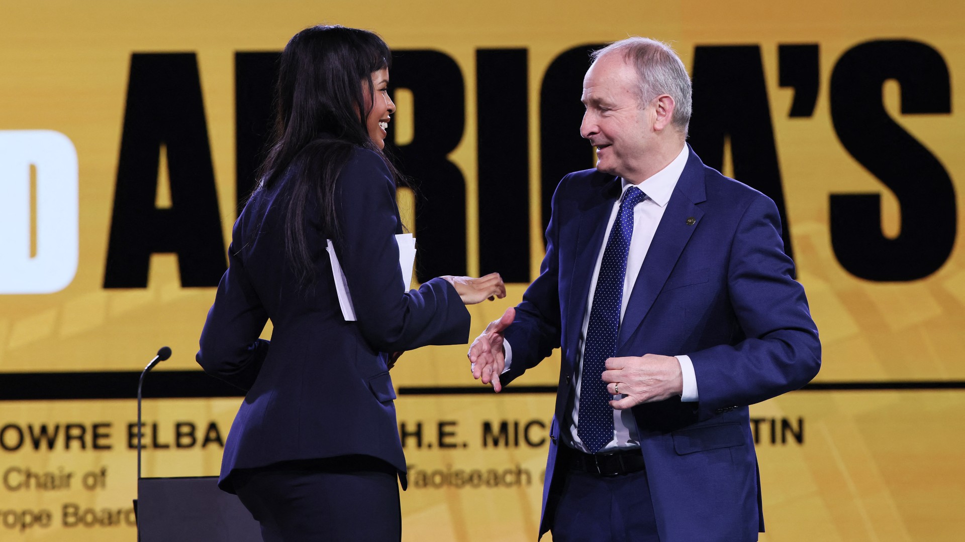 Sabrina Elba and Micheál Martin, Ireland’s Taoiseach, Prime Minister of Ireland speak on stage during Global Citizen NOW: Johannesburg on November 21, 2025 in Johannesburg, South Africa.