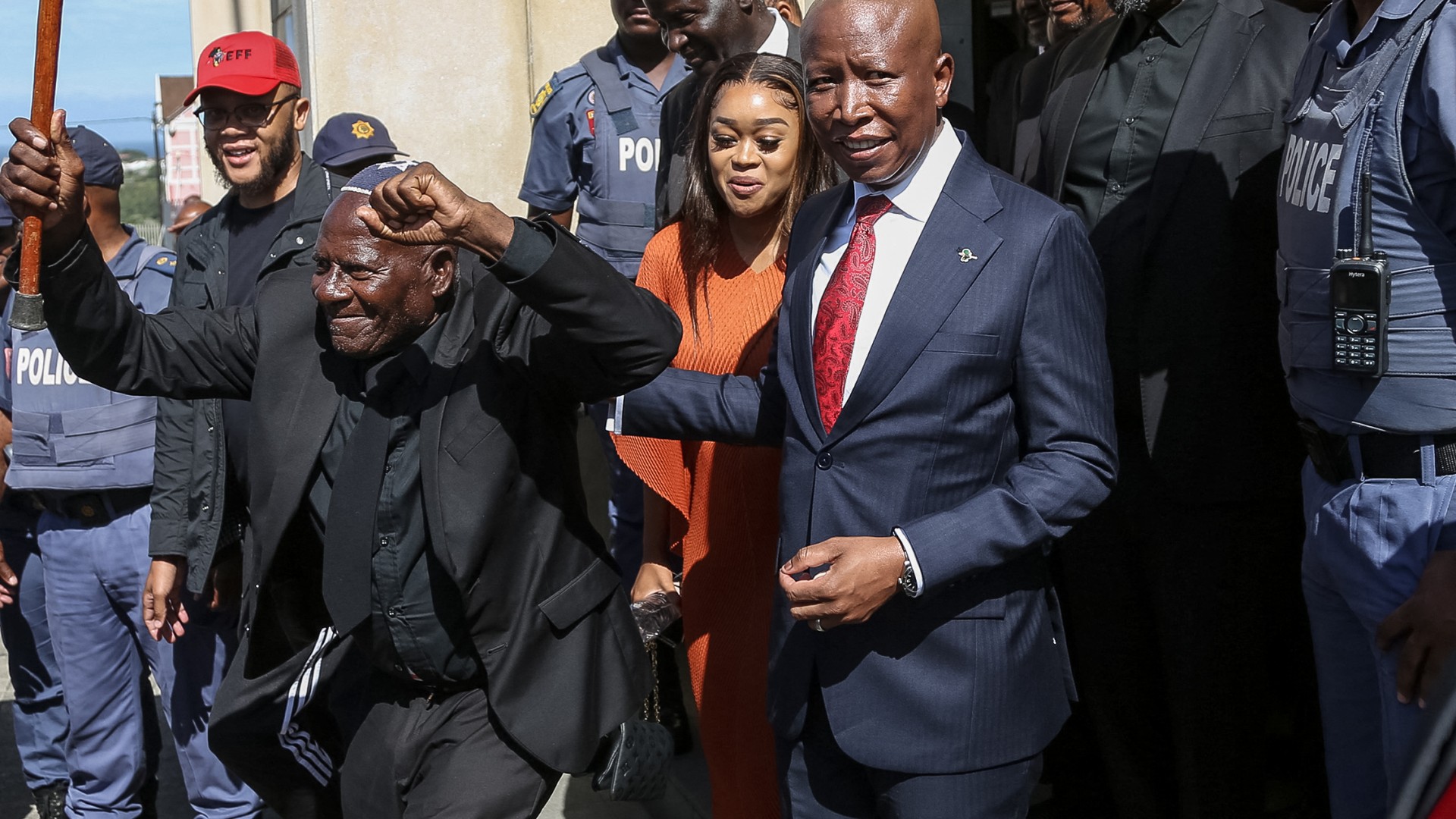Economic Freedom Fighters (EFF) leader Julius Malema (CR) and his wife Mantwa Malema (CL) leave the KuGompo City Regional court in East London on April 15, 2026 following his sentencing for firing an assault rifle at a rally eight years ago.