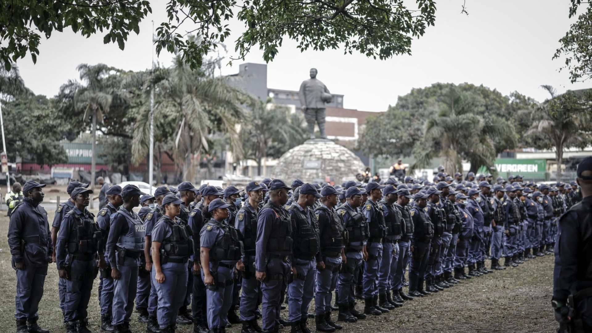 Members of the South African Police Service (SAPS) stand in formation as they receive instructions ahead of planned demonstrations by the March and March movement. AFP/Marco Longari