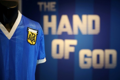 A football shirt worn by Argentina's Diego Maradona during the 1986 World Cup quarter-final match against England is seen at Sotheby's auction house in London in April ahead of its sale for $9.3 million May 4, 2022