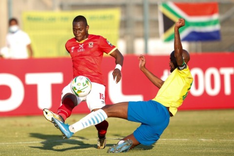 South Africa defender Mosa Lebusa (R) conceded an own goal in a 4-1 home defeat by Angola in an African Nations Championship qualifier