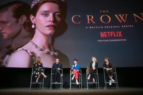 Cast members of the first season of Netflix's The Crown, including Claire Foy, who portrayed a young Queen Elizabeth II, are seen in 2018. Netflix says it has suspended filming on the show's latest season out of resepect for the late monarch 