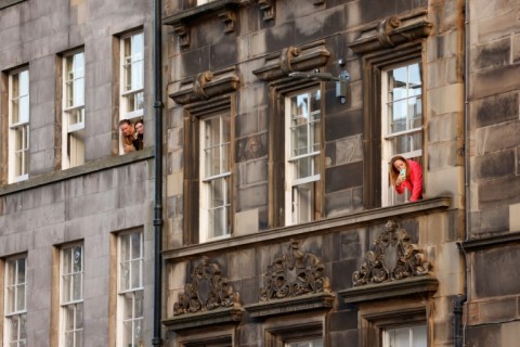 People in Edinburgh watch events 