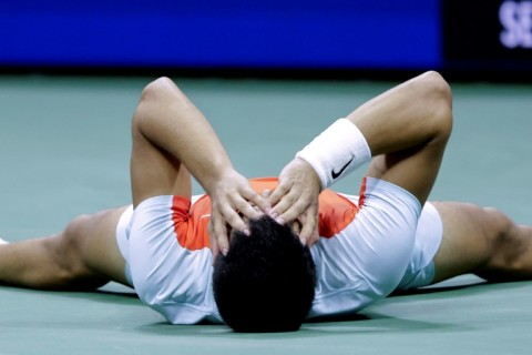 Final push: Carlos Alcaraz celebrates after defeating Frances Tiafoe in the US Open semi-final