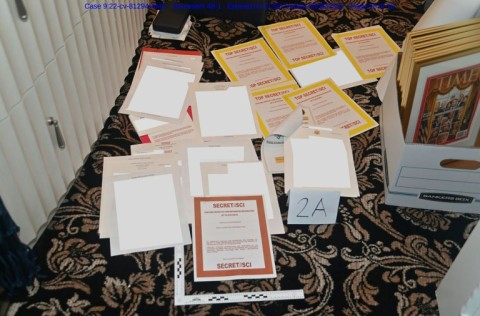 This undated file photo released by the US Department of Justice on August 31, 2022 shows a photo of documents allegedly seized at Donald Trump's Mar-a-Lago resort spread over a carpet