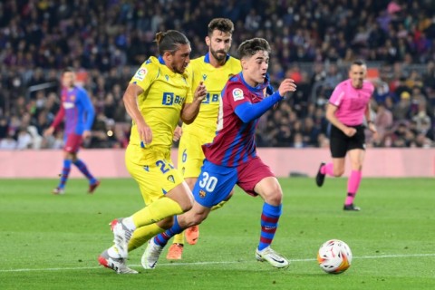 Gavi (R) has already made 54 appearances for the Barcelona first team