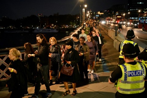 The first public mourners were allowed into the vast medieval Westminster Hall on Wednesday