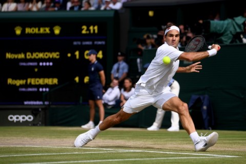 Epic defeat: Federer in action against Novak Djokovic in the record-setting 2019 final