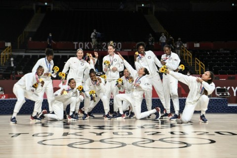 The USA celebrate their gold medals at the Tokyo Olympics. They could begin their bid to win a fourth straight women's basketball World Cup in Sydney with just seven players on court
