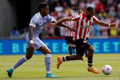 Bryan Mbeumo (R) stages a Brentford ataack against Leeds United in the English Premier League. 