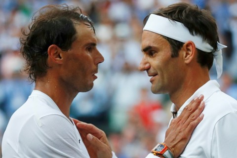 Roger Federer (right) wants to team up with long-time rival Rafael Nadal at the Laver Cup in London