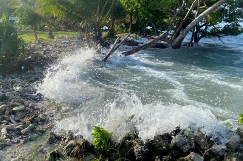 A photo taken on December 6, 2021 shows high-tide flooding hitting low sections of Majuro Atoll in the Marshall Islands