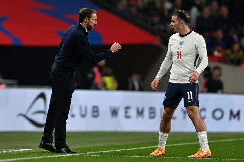 England manager Gareth Southgate gives instructions to Jack Grealish