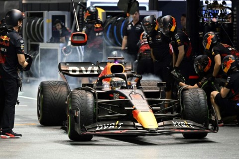 Max Verstappen leaves the Red Bull pit during qualifying for the Singapore Grand Prix