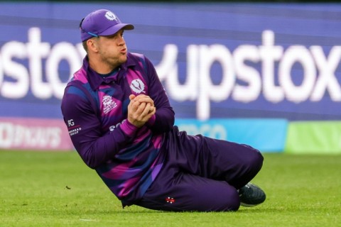 Scotland’s George Munsey takes a catch to dismiss West Indies' batsman Kyle Mayers