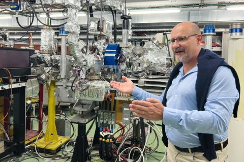 Facility coordinator Roberto Corsini shows off a 40-metre linear particle accelerator at CERN which could push the boundaries of cancer treatment