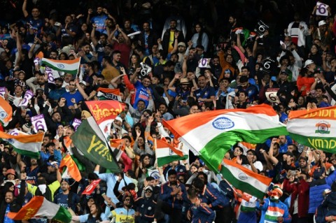 Indian fans celebrate at the Melbourne Cricket Ground