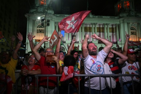 Supporters of Luiz Inacio Lula da Silva celebrate after he won the presidential runoff election over his far-right rival and incumbent Jair Bolsonaro