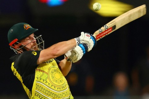Australia captain Aaron Finch hits a six against Ireland 