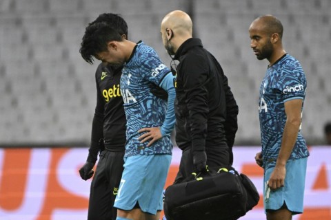 Son Heung-Min (left) is to undergo facial surgery just over three weeks before the World Cup begins