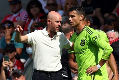 Cristiano Ronaldo (right) said he does not respect Manchester United manager Erik ten Hag (left)