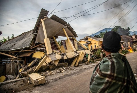 Indonesian authorities said more than 2,000 houses were damaged by the quake
