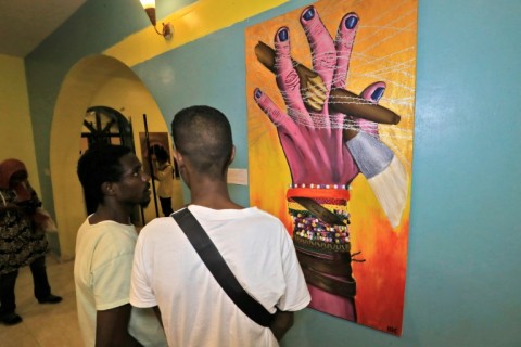 Sudanese visit a Rastafarian art exhibition in the capital Khartoum