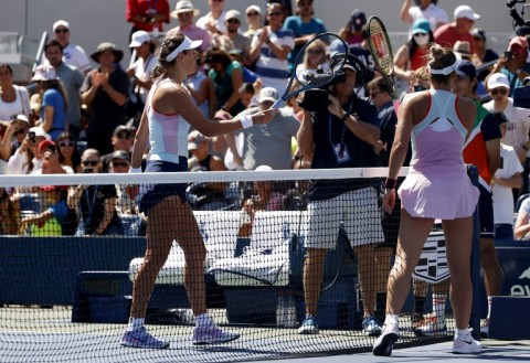 Let's not shake on it: Marta Kostyuk (right) of Ukraine refused to shake hands with Belarusian opponent Victoria Azarenka at the US Open 