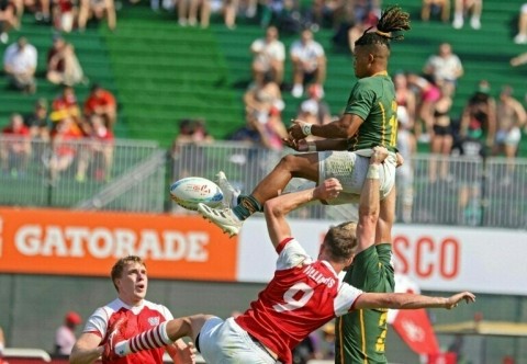South Africa lost to Britain but advanced to the quarter-finals of the World Rugby Sevens Series in Dubai