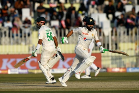 Pakistan captain Babar Azam and teammate Mohammad Rizwan running between the wickets in Rawalpindi on Saturday