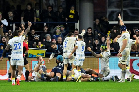 Clermont celebrate Loic Godener's try against Montpellier