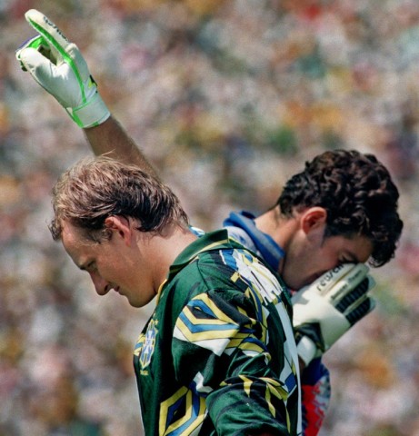 Claudio Taffarel raises his finger aloft next to Italy goalkeeper Gianluca Pagliuca during the penalty shoot-out in the 1994 World Cup final