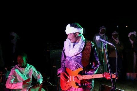 Oumara Moctar, also known as Bambino, performing at the Chiriet dunes northeast of Iferouane

