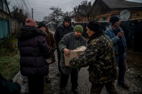 Residents of Bakhmut in east Ukraine collect aid