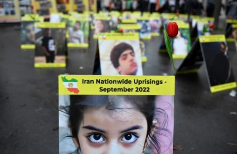 This photograph taken near the French National Assembly in Paris on December 6 shows placards with portraits of the victims of Iran's crackdown