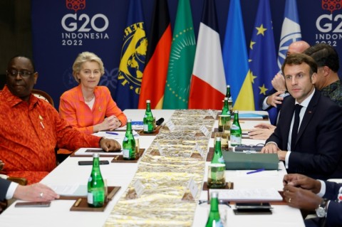 Senegalese President Macky Sall, the current chair of the African Union, takes part in a Group of 20 meeting in Bali, Indonesia in November 2022 with French President Emmanuel Macron and European Commission President Ursula von der Leyen 