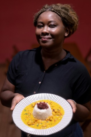 Chef Dandara Batista displays a dish at her eatery called Afro Gourmet in Rio 