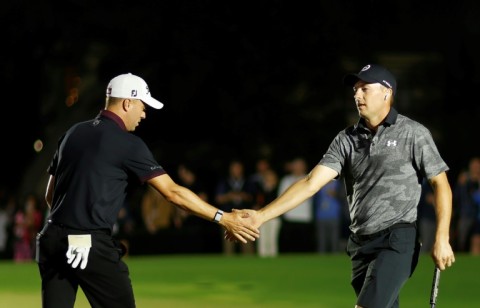 Americans Justin Thomas, left, and Jordan Spieth celebrate their exhibition golf victory over Tiger Woods and Rory McIlroy at The Match