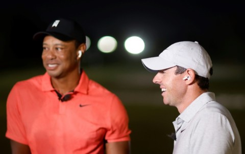 Tiger Woods, left, and top-ranked Rory McIlroy laugh during The Match, which they lost to Justin Thomas and Jordan Spieth 