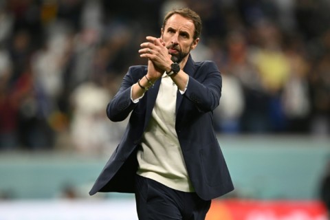 England manager Gareth Southgate applauds supporters after his team's World Cup exit