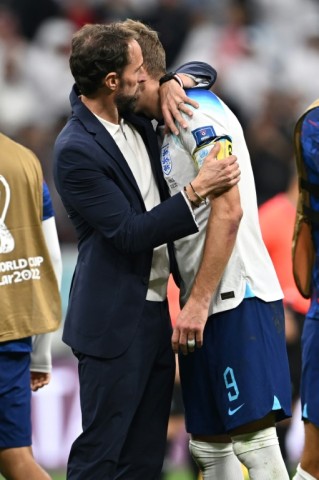 England manager Gareth Southgate consoles Harry Kane after the team's World Cup exit