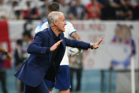 Deschamps passes on instructions from the touchline during Saturday's quarter-final against England