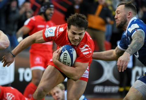 Antoine Dupont (C) scored two tries for Toulouse as they beat Sale 45-19 on Sunday