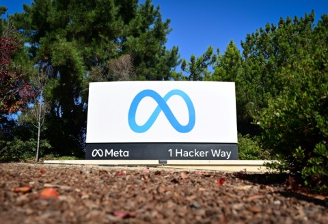 Meta's logo at the entrance to its headquarters in California