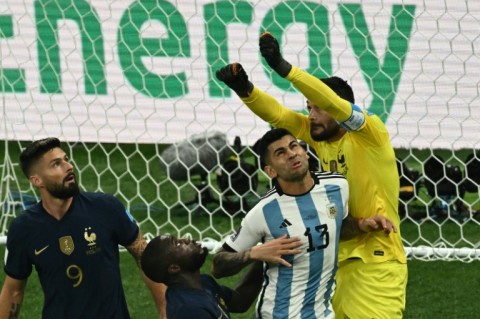 Tottenham team-mates Cristian Romero (13) and goalkeeper Hugo Lloris collided in the World Cup final