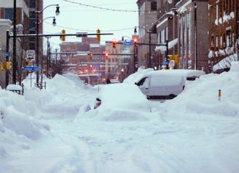 Buffalo has been overwhelmed by a relentless blizzard that has caused at least 27 deaths in the region and trapped many more in their cars and homes