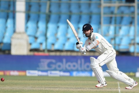 New Zealand's Kane Williamson plays a shot on his way to a century against Pakistan in Karachi