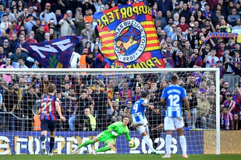 Espanyol's Spanish striker Joselu nets in the derby clash with Barcelona