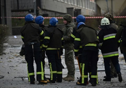 Rescue workers cordoned off nearby streets after the strikes