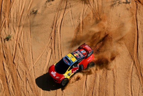 French rally great Sebastien Loeb lost further ground on overall leader and defending champion Nasser Al-Attiyah after rolling his car during the fifth stage
